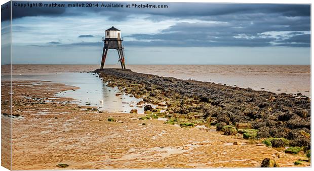 Lighthouse at Low Tide  Canvas Print by matthew  mallett