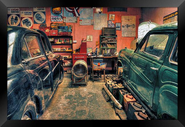  Vintage cars in a garage for repair Framed Print by Mal Bray