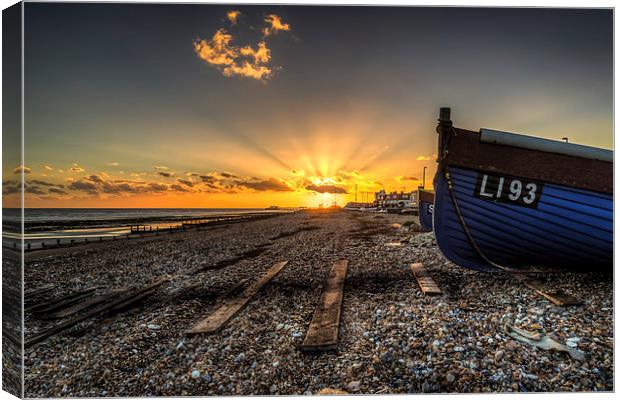  Worthing sunset and fishing boat Canvas Print by Simon West