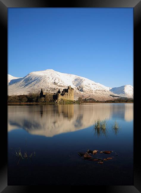 Kilchurn Castle reflecting on Loch Awe in Winter Framed Print by Maria Gaellman