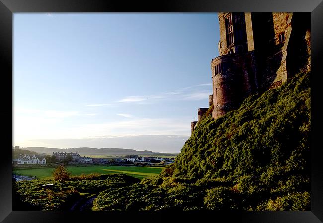 Stunning view from behind Bamburgh Castle Framed Print by Michael Maher