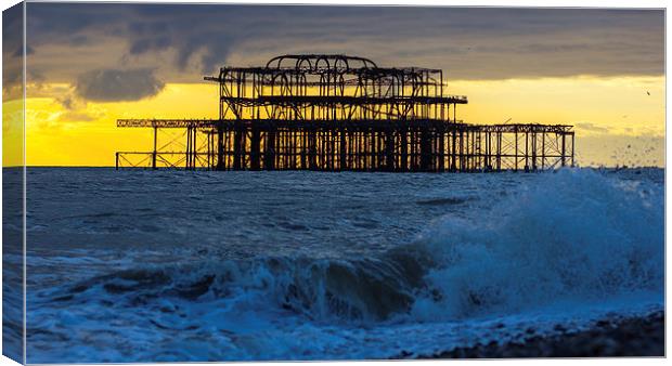 Brighton West Pier at sunset Canvas Print by Dean Messenger