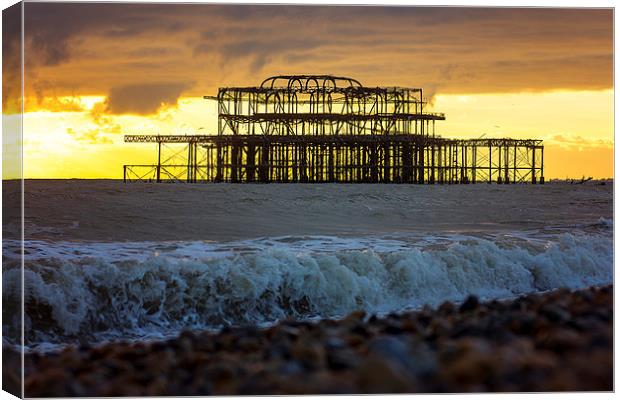  Brighton West Pier sunset Canvas Print by Dean Messenger