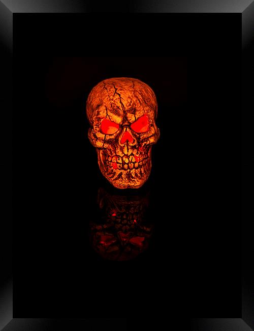 Glowing Halloween Skull Reflecting Evil Framed Print by Steve Purnell