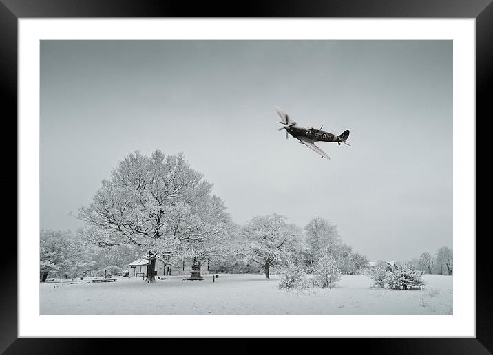 A Spitfire Winter  Framed Mounted Print by J Biggadike
