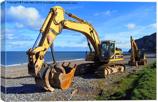 A Caterpillar excavator resting on the beach Canvas Print by Frank Irwin