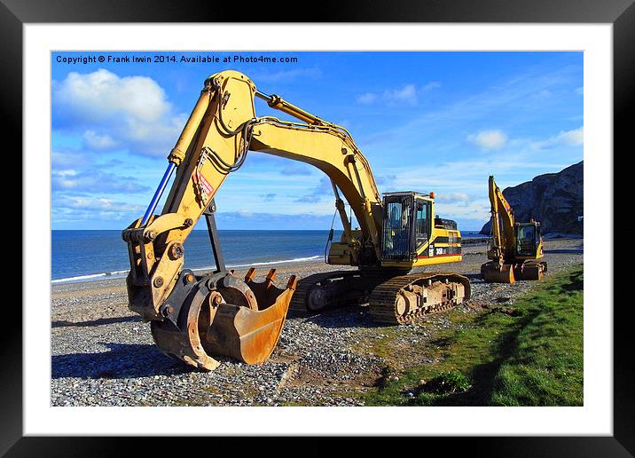A Caterpillar excavator resting on the beach Framed Mounted Print by Frank Irwin