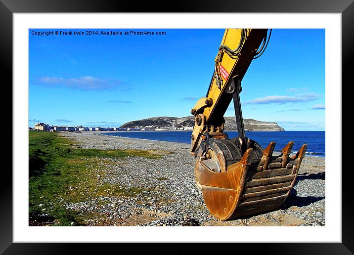  A 'Caterpillar' excavator resting its bucket on t Framed Mounted Print by Frank Irwin