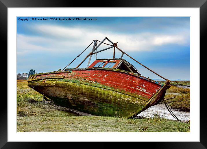 An abandoned and worse for wear boat Framed Mounted Print by Frank Irwin