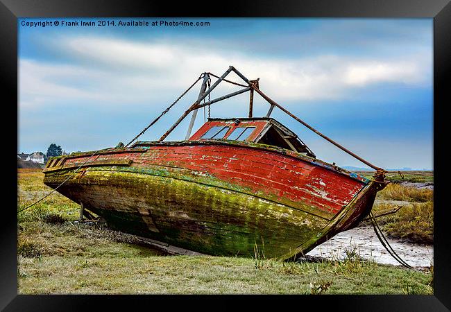 An abandoned and worse for wear boat Framed Print by Frank Irwin