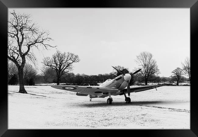 Spitfire in the snow black and white version Framed Print by Gary Eason