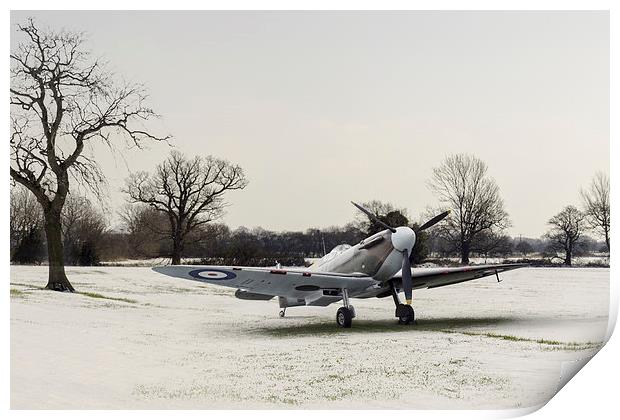 Spitfire in the snow Print by Gary Eason