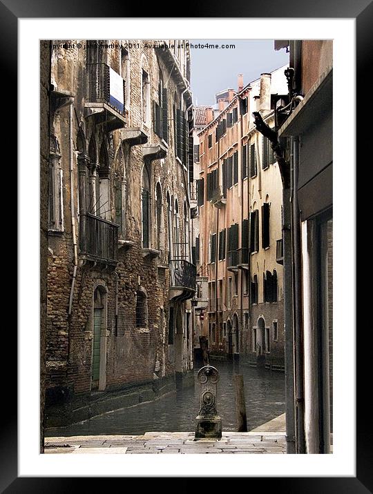 Inside Venice - Tall buildings dwarf a Venetian Ca Framed Mounted Print by john hartley