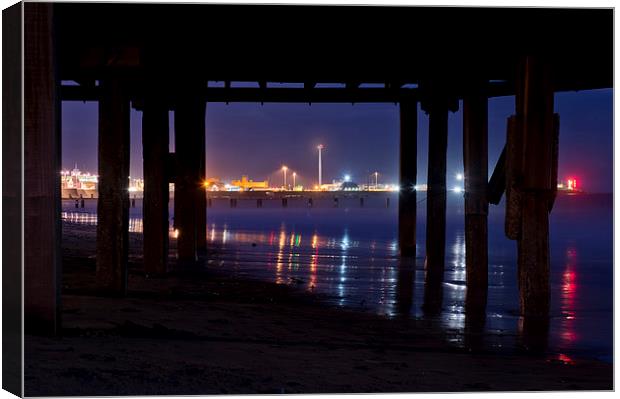  Through the pier Canvas Print by Paul Nichols