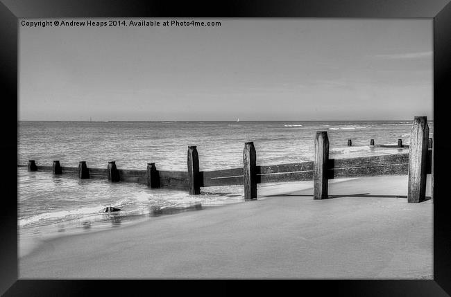 Barmouth Traditional sea wave breaker on beach. Framed Print by Andrew Heaps