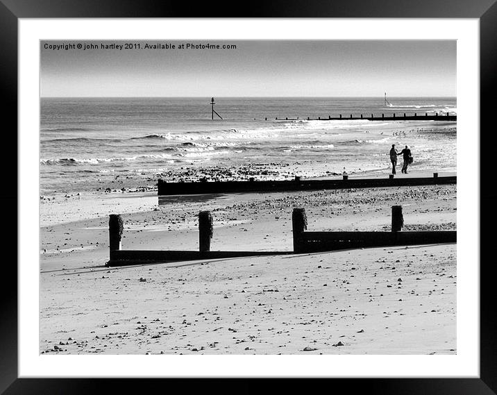 "Just we two" - walkers on Cromer Beach  Framed Mounted Print by john hartley