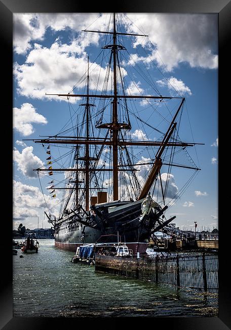 HMS WARRIOR in PORTSMOUTH HARBOUR  Framed Print by DAVE BRENCHLEY
