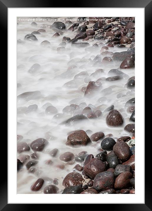 Sea washing over rocks Framed Mounted Print by Graham Moore