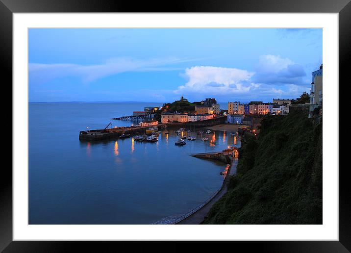 Sunset Tenby Harbour with lights Framed Mounted Print by Jonathan Evans