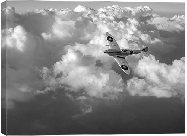 Soaring silver Spitfire cloudscape black and white Canvas Print by Gary Eason