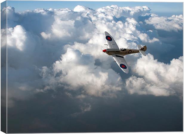 Soaring silver Spitfire cloudscape Canvas Print by Gary Eason