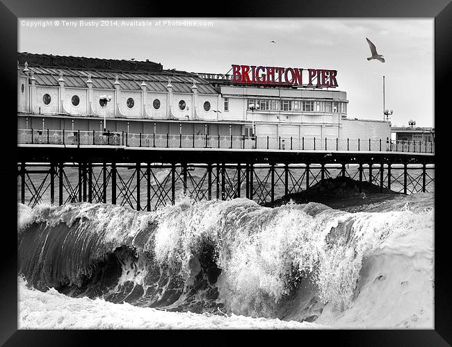  Brighton Pier storm Framed Print by Terry Busby