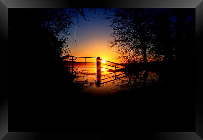  Sunrise thru the flooded gate Framed Print by Ross Lawford