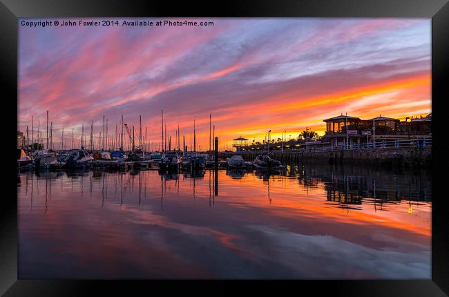 Torquay Harbour Sunset Framed Print by John Fowler