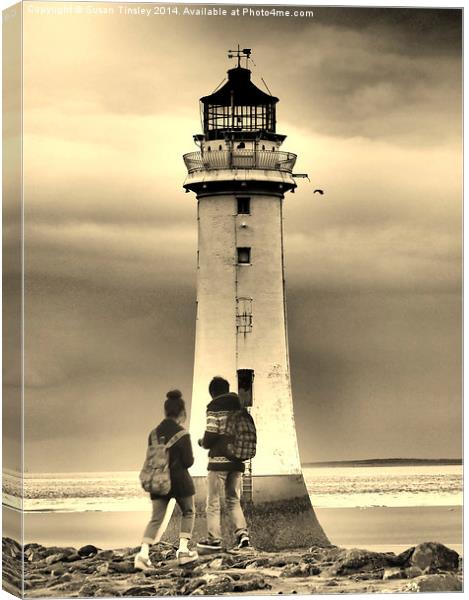 In front of the lighthouse Canvas Print by Susan Tinsley