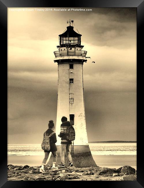 In front of the lighthouse Framed Print by Susan Tinsley