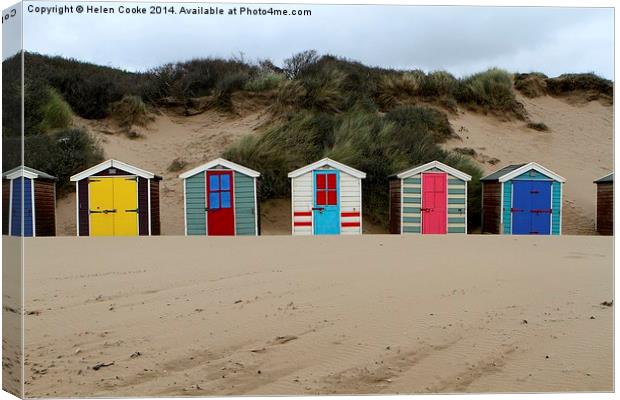 Beach huts at Saunton sands  Canvas Print by Helen Cooke