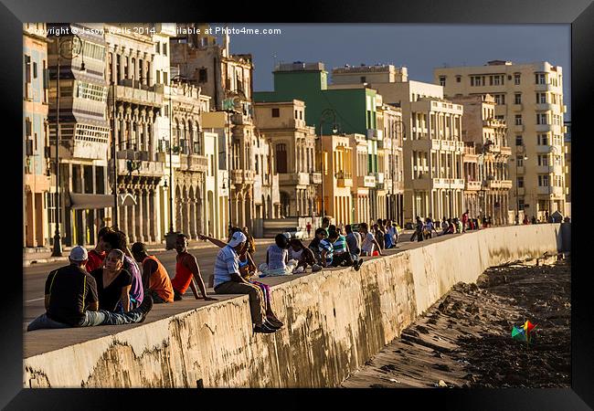 Locals gather on the seawall of Havana Framed Print by Jason Wells