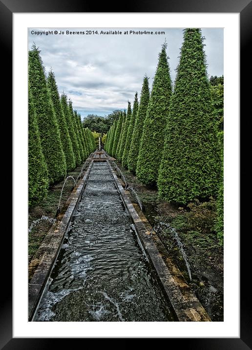conifer lined water feature Framed Mounted Print by Jo Beerens