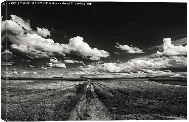 drifting clouds Canvas Print by Jo Beerens