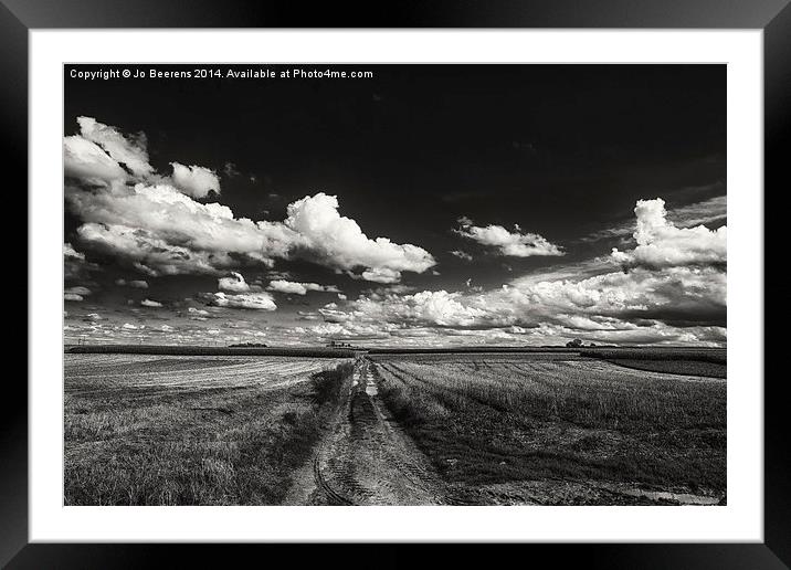 drifting clouds Framed Mounted Print by Jo Beerens
