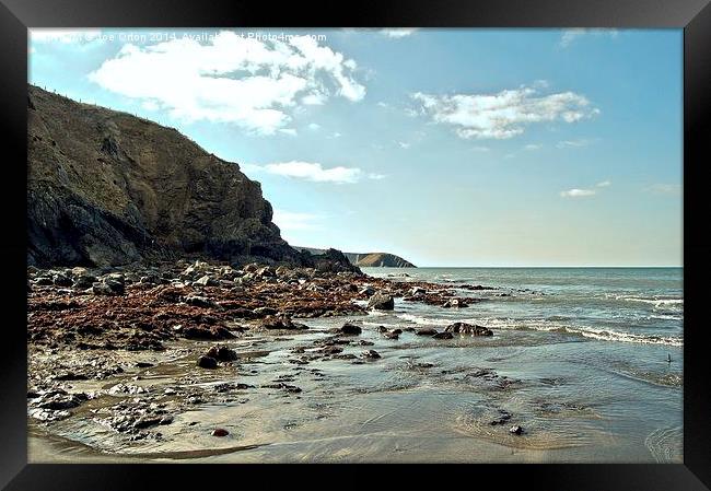  Rocks and Sand view Framed Print by Joe Orton