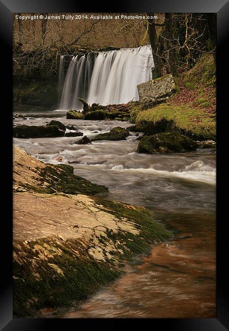  A misty curtain of water falls Framed Print by James Tully