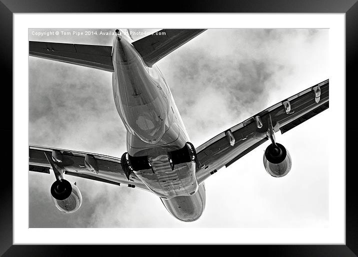 Mighty Emirates A380 Glides into the distance.. Framed Mounted Print by Tom Pipe