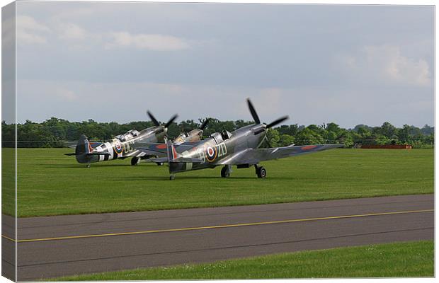 Three Spitfires at Duxford Canvas Print by Oxon Images