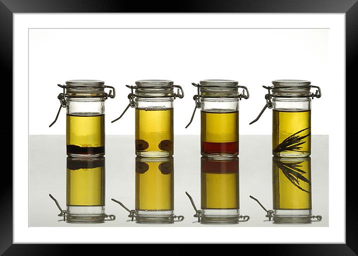 aromatic olive oils over white Framed Mounted Print by Josep M Peñalver