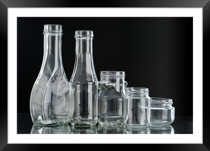 Glass bottles on black background Framed Mounted Print by Josep M Peñalver