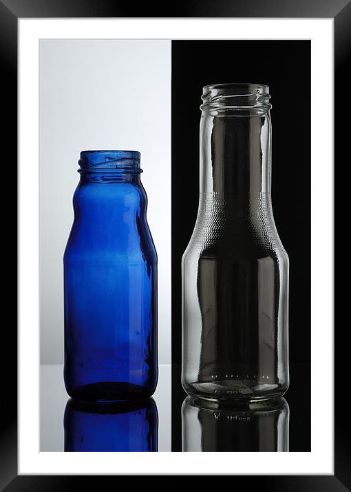 Glass bottles. Transparent over black, blue over w Framed Mounted Print by Josep M Peñalver