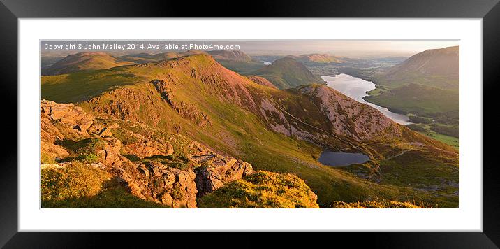 Dawn breaks over Buttermere Framed Mounted Print by John Malley