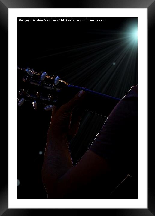 Man playing guitar in concert  Framed Mounted Print by Mike Marsden