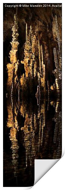 Spectacular stalagmites reflected in water Print by Mike Marsden