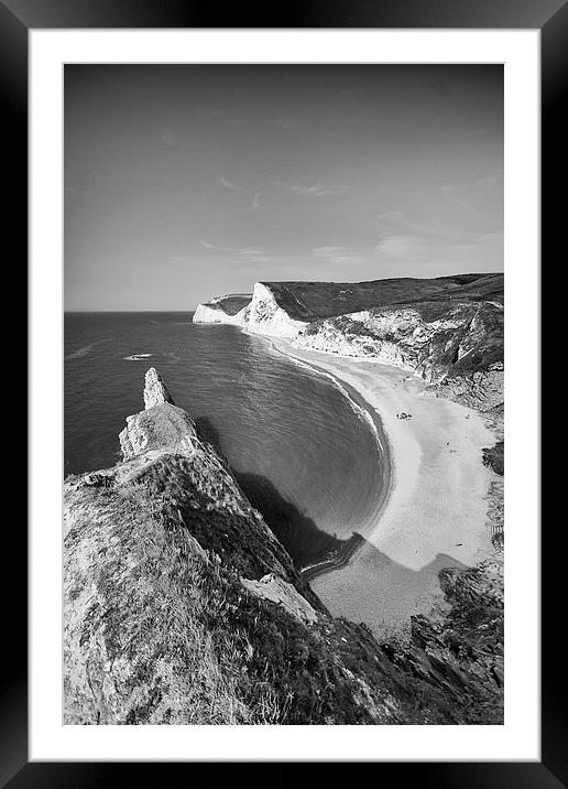 Durdle Promontory in mono.  Framed Mounted Print by Mark Godden