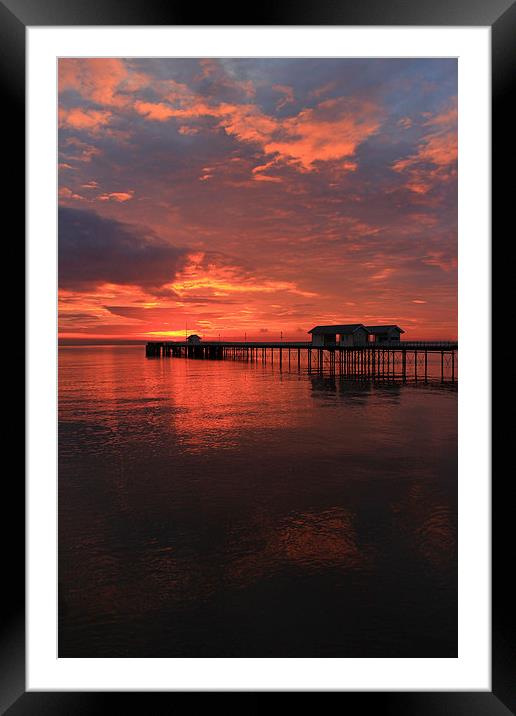 Penarth Pier and sun rise over the bristol Channel Framed Mounted Print by Jonathan Evans