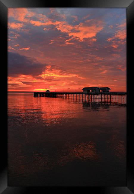Penarth Pier and sun rise over the bristol Channel Framed Print by Jonathan Evans