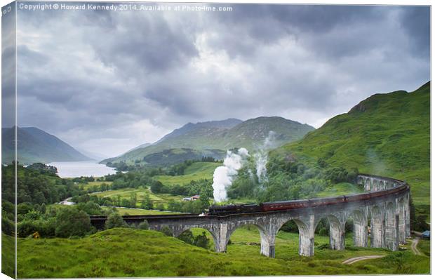 Jacobite Express crossing Glenfinnan Viaduct Canvas Print by Howard Kennedy