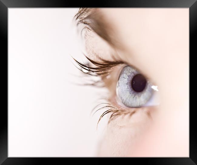 Blue eye with waterdrops on eyelashes Framed Print by Gabor Pozsgai